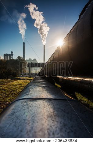 Power station with smoking chimney symbol of environmental pollution