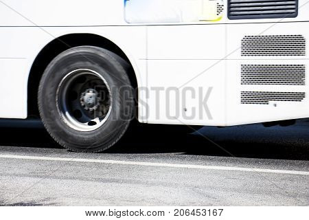 bus wheel driving on the main road at high speed