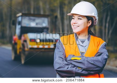 female worker road construction infrastructure repair pavement