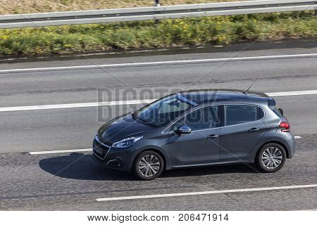 Frankfurt Germany - Sep 19 2017: French supermini Peugeot 208 driving on the highway in Germany