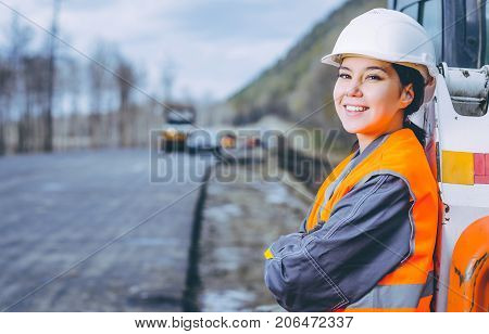 female worker road construction infrastructure repair pavement