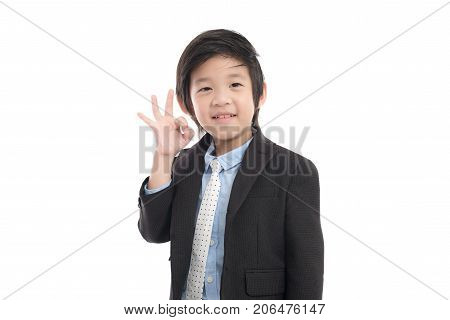 Cute Asian Child In Business Suit Index Finger Pointing On White Background Iolated