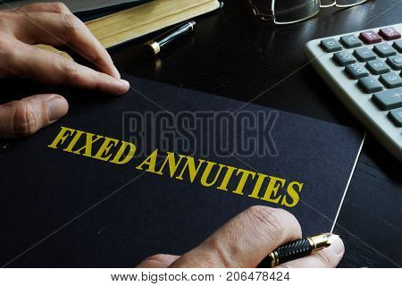 Fixed Annuities. Book on an office table.