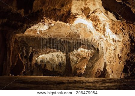 Huge cave with water reflection in france