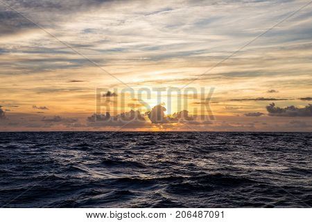 Sunset in the middle of Atlantic while sailing