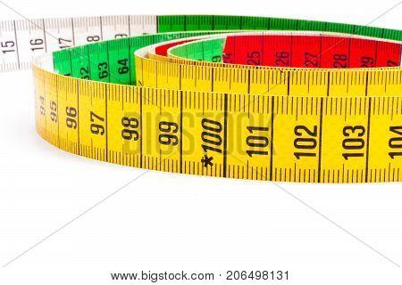 Yellow tailor meter. Bright colors. Measurement of the figure.