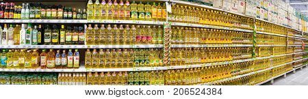 BANGKOK THAILAND - AUGUST 10: BigC Extra Petchkasem fully stocks shelves with new shipment vegetable cooking oils on August 10 2017 in Bangkok.