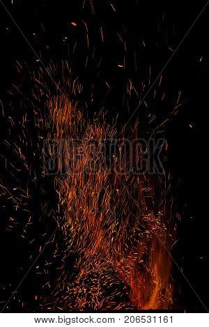 Fire flames on a black background. Blaze fire flame texture background. Close up of fire flames isolated on black background. Burn. Abstract fire flames background. Texture.