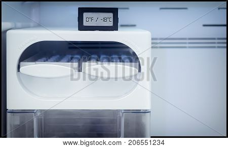 Digital Thermometer shows Ideal Temperature of Freezer at 0° F (-18° C)