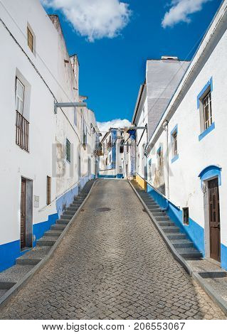Beautiful street of Arraiolos Portugal. Blue and white street