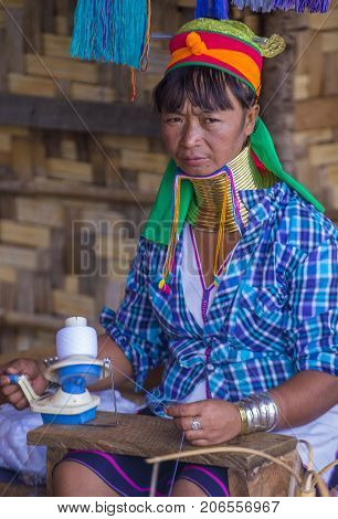 KAYAN STATE MYANMAR - SEP 09 : Portrait of Kayan tribe woman in Kayan state Myanmar on September 09 2017 Kayan tribe woman are well known for wearing neck rings.