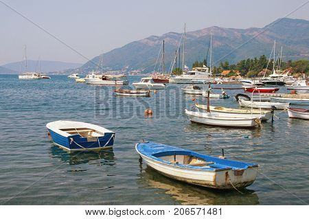 Fishing boats on the water near seaside village of Seljanovo. Bay of Kotor (Adriatic Sea), Tivat, Montenegro