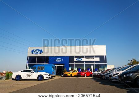 Prague, Czech Republic - September 29: Cars In Front Of Ford Motor Company Dealership Building On Se
