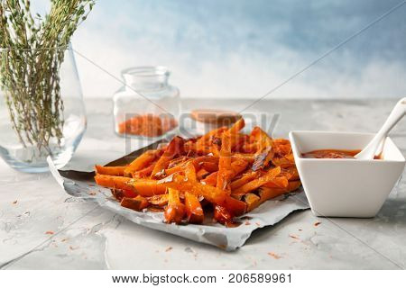 Sweet potato fries on table