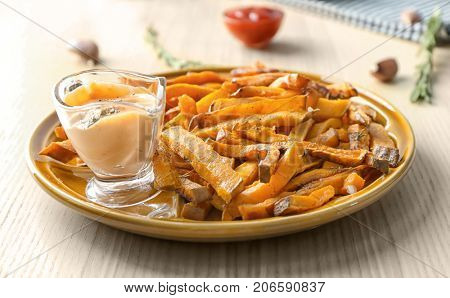 Sweet potato fries on table