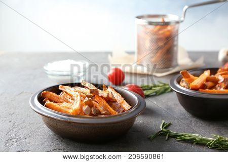 Sweet potato fries on table