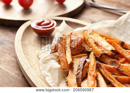 Sweet potato fries on table