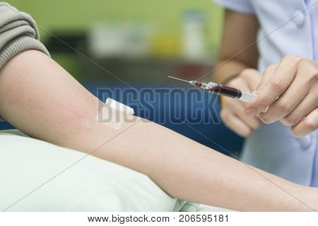 Blood collect by nurse in the hospital Blood test examination and donate concept. Hospital and health care concept