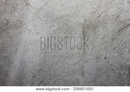 Gray Texture With Scratched Plaster On The Wall,
