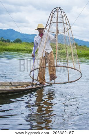 INLE LAKE MYANMAR - SEP 07 : Burmese fisherman at Inle lake Myanmar on September 07 2017 inle Lake is a freshwater lake located in Shan state