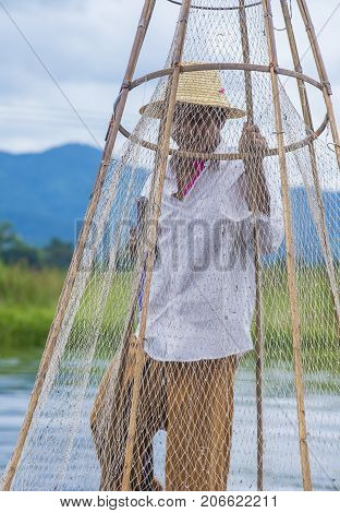 INLE LAKE MYANMAR - SEP 07 : Burmese fisherman at Inle lake Myanmar on September 07 2017 inle Lake is a freshwater lake located in Shan state