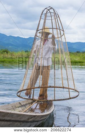 INLE LAKE MYANMAR - SEP 07 : Burmese fisherman at Inle lake Myanmar on September 07 2017 inle Lake is a freshwater lake located in Shan state