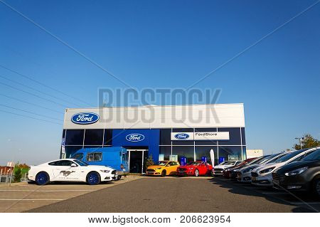 Prague, Czech Republic - September 29: Cars In Front Of Ford Motor Company Dealership Building On Se