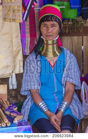 KAYAN STATE MYANMAR - SEP 09 : Portrait of Kayan tribe woman in Kayan state Myanmar on September 09 2017 Kayan tribe woman are well known for wearing neck rings.