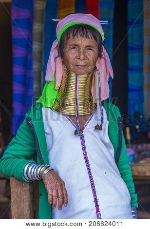 KAYAN STATE MYANMAR - SEP 09 : Portrait of Kayan tribe woman in Kayan state Myanmar on September 09 2017 Kayan tribe woman are well known for wearing neck rings.