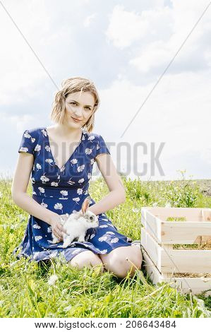 Young Girl With A Little Rabbit.