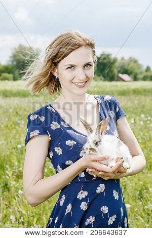Young Girl With A Little Rabbit.