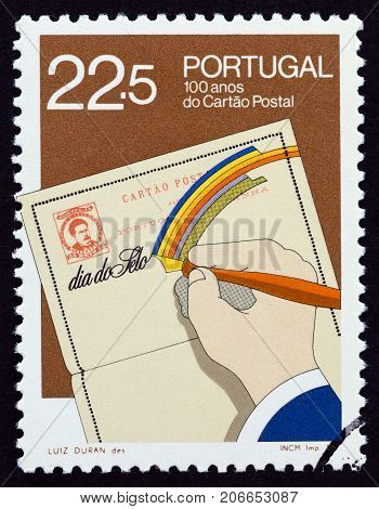 PORTUGAL - CIRCA 1986: A stamp printed in Portugal issued for the 100th anniversary of the first Portuguese postcard shows postcard, circa 1986.
