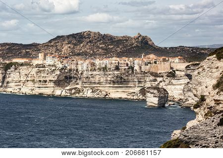 Town Of Bonifacio Clinging To The Cliffs In Corsica