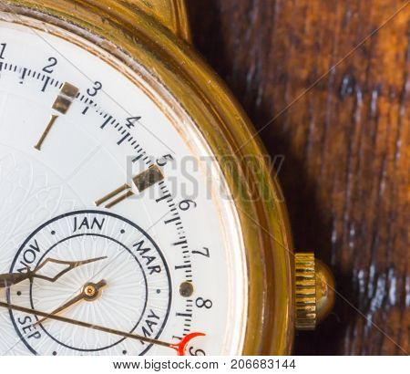 A Macro view of a gold watch.