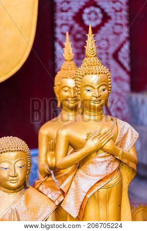 Statues Of Buddhist Gods, Louangphabang, Laos. Close-up. Vertical.