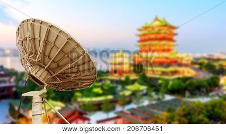 Satellite antenna and Nanchang Tengwangge night view