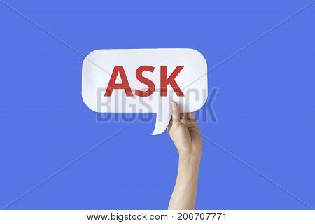 Human Hands Holding A Bubble Speech Of Word 'ask' Isolated In Blue Background