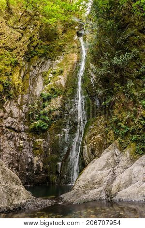 Summer Time Niagara Falls In Goldstream Provincial Park Vancouver Island British Columbia Canada.