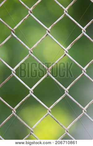 Background of the metal mesh fence . Photo of abstract background