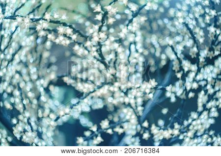 Christmas Led Lights In The Form Of Flowers, Blue Bokeh, Selected Focus