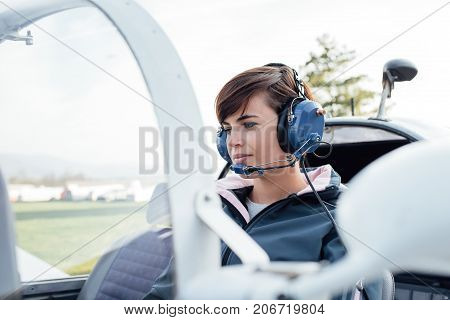 Pilot In The Aircraft Cockpit