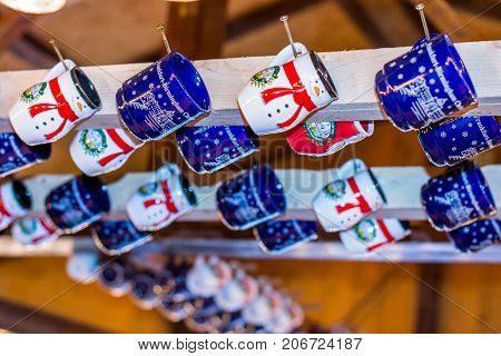 Empty gluehwein mugs christmas market stall decoration.