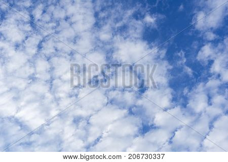 View on beautiful white clouds in a blue sky. Clouds and Skies in the Morning. The Sun behind Clouds. Fresh Air. Cloudy Weather. Cloud Formations. White Clouds