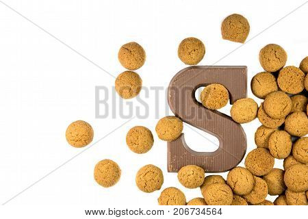 Handful Of Scattered Pepernoten Cookies With Chocolate Letter