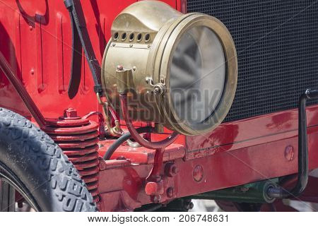 Kerosene lamp old brass car headlight in oldtimer