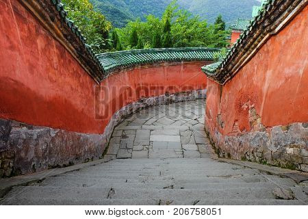 WUDANG SHAN HUBEI CHINA - SEP 09 2017: at the entrance to the Tai chi bua- ancient temple is a center of the Taoist Association of Wudang Mountain. This here is the place for the scene in Journey to the west. And It's especially name.