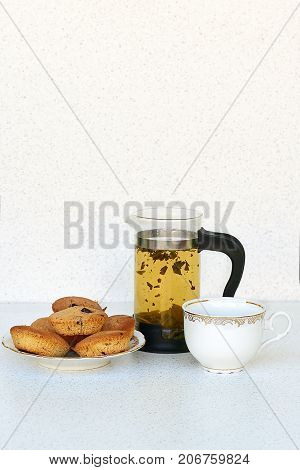 Coconut cookies with chocolate, tea in french press and cup - vertical mock up