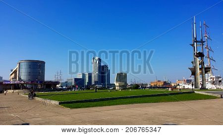 Gdynia, Poland - October 01, 2017: People visit Kosciuszko Square - representation places in Gdynia, on the background of the city of Gdynia, Poland.