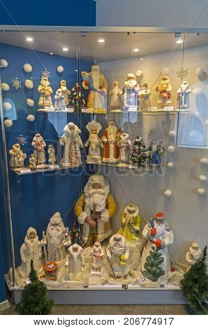 Figurines Of Santa Clauses And Snow Maidens.