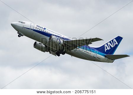 OSAKA, JAPAN - AUG. 13, 2017: Boeing 737-500 taking off from the Itami International Airport in Osaka, Japan.